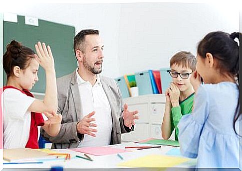 Teacher with young students