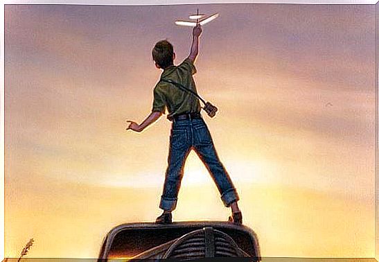 Boy Standing On Top Of A Car To Fly His Model Airplane Because He Wants To Nurture His Creativity