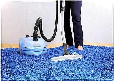 Woman vacuuming as a form of housework