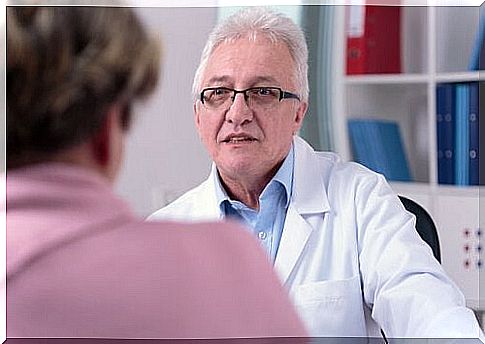 Man talking to doctor