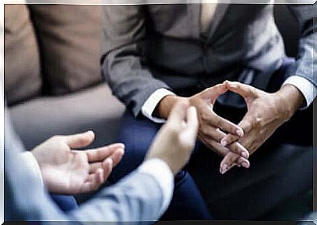 Two people in conversation to resolve a conflict through narrative mediation